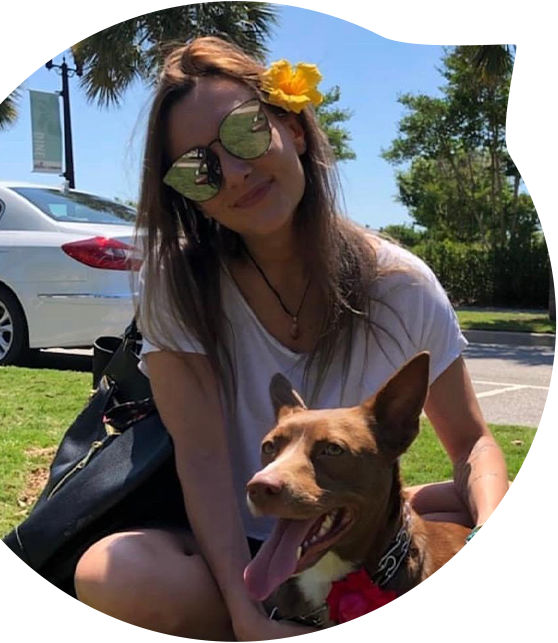 young lady with sunglasses and a dog